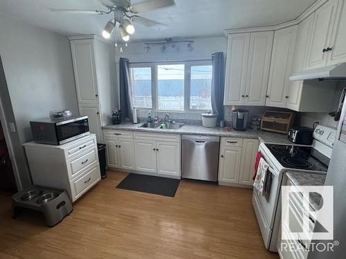 4012 55 Street, Wetaskiwin, AB - Indoor Photo Showing Kitchen With Double Sink