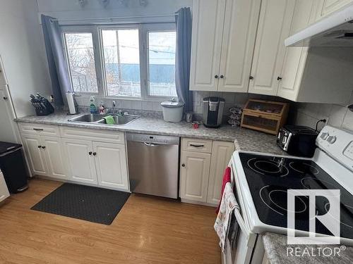 4012 55 Street, Wetaskiwin, AB - Indoor Photo Showing Kitchen With Double Sink