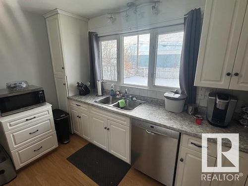 4012 55 Street, Wetaskiwin, AB - Indoor Photo Showing Kitchen With Double Sink