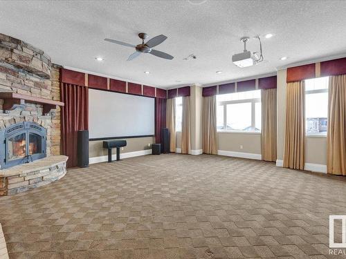 27 Kingdom Place, Leduc, AB - Indoor Photo Showing Other Room With Fireplace