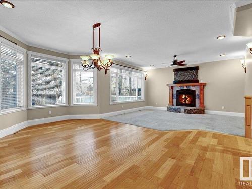 27 Kingdom Place, Leduc, AB - Indoor Photo Showing Living Room With Fireplace