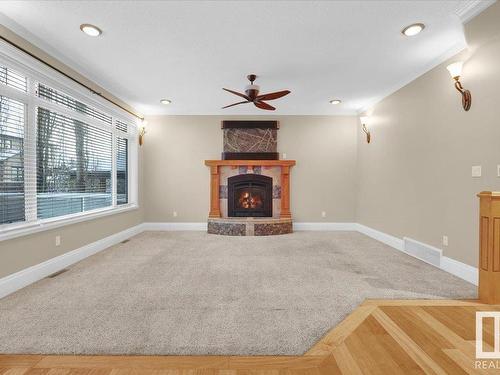 27 Kingdom Place, Leduc, AB - Indoor Photo Showing Living Room With Fireplace