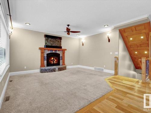 27 Kingdom Place, Leduc, AB - Indoor Photo Showing Living Room With Fireplace