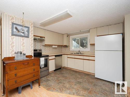 #9, 223014 Twp Rd 652, Rural Athabasca County, AB - Indoor Photo Showing Kitchen With Double Sink