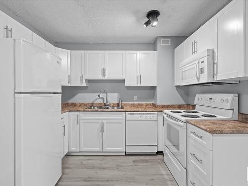 308 9710 105 Street, Edmonton, AB - Indoor Photo Showing Kitchen With Double Sink