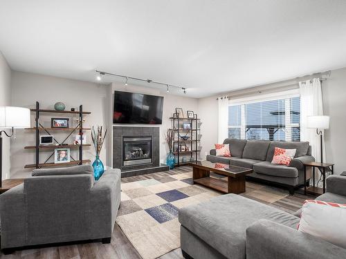 1257 Westerra Crescent, Stony Plain, AB - Indoor Photo Showing Living Room With Fireplace