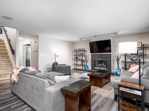 1257 Westerra Crescent, Stony Plain, AB - Indoor Photo Showing Living Room With Fireplace