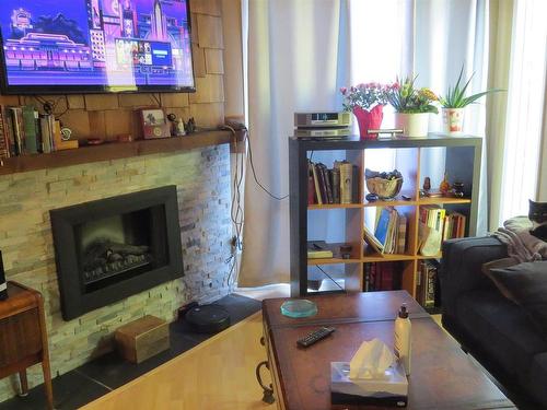 260 Richfield Road Nw, Edmonton, AB - Indoor Photo Showing Living Room With Fireplace