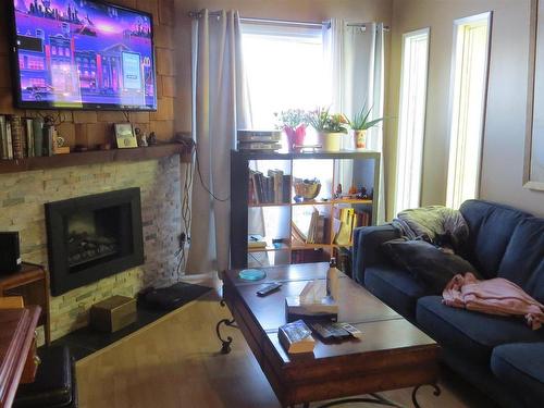 260 Richfield Road Nw, Edmonton, AB - Indoor Photo Showing Living Room With Fireplace