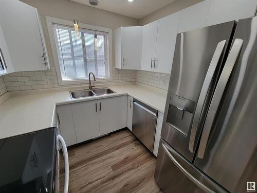 990 13 Street, Cold Lake, AB - Indoor Photo Showing Kitchen With Double Sink