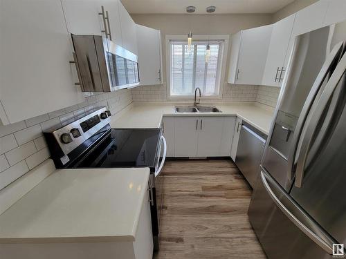 990 13 Street, Cold Lake, AB - Indoor Photo Showing Kitchen With Double Sink