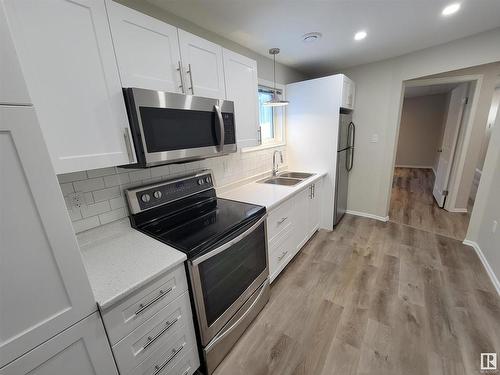 990 13 Street, Cold Lake, AB - Indoor Photo Showing Kitchen With Double Sink