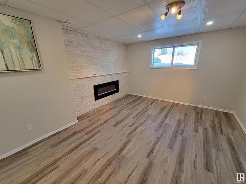 990 13 Street, Cold Lake, AB - Indoor Photo Showing Other Room With Fireplace