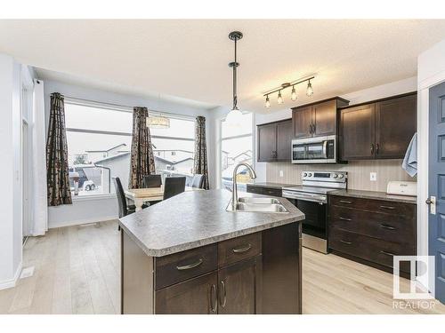 146 Southfork Drive, Leduc, AB - Indoor Photo Showing Kitchen With Double Sink