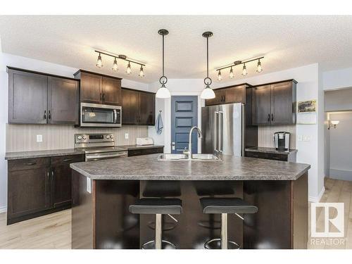 146 Southfork Drive, Leduc, AB - Indoor Photo Showing Kitchen With Upgraded Kitchen