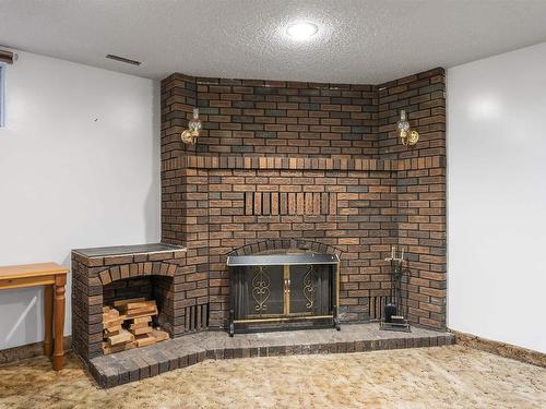 2 Labelle Crescent, St. Albert, AB - Indoor Photo Showing Living Room With Fireplace