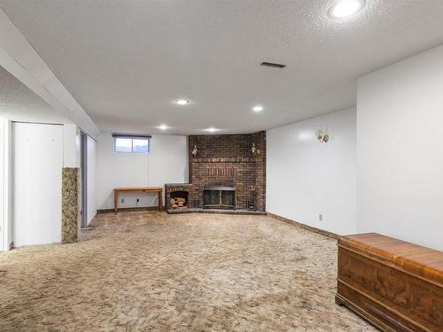 2 Labelle Crescent, St. Albert, AB - Indoor Photo Showing Basement With Fireplace