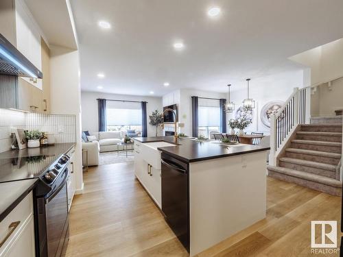 314 Juniper Cove, Leduc, AB - Indoor Photo Showing Kitchen With Upgraded Kitchen