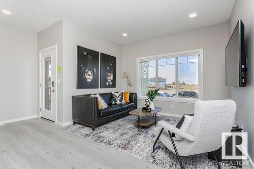 200 Hawthorn Way, Leduc, AB - Indoor Photo Showing Living Room