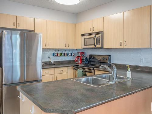 1407 10180 104 Street, Edmonton, AB - Indoor Photo Showing Kitchen With Double Sink