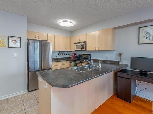 1407 10180 104 Street, Edmonton, AB - Indoor Photo Showing Kitchen With Double Sink