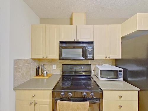 307 5280 Terwillegar Boulevard, Edmonton, AB - Indoor Photo Showing Kitchen