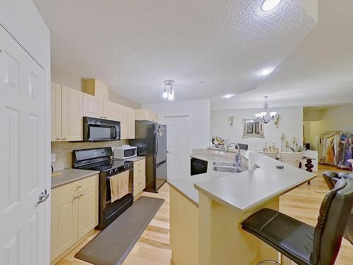 307 5280 Terwillegar Boulevard, Edmonton, AB - Indoor Photo Showing Kitchen