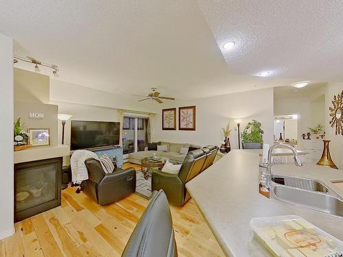 307 5280 Terwillegar Boulevard, Edmonton, AB - Indoor With Fireplace