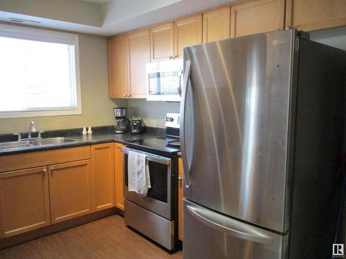 107 260 Lewis Estates Boulevard Nw, Edmonton, AB - Indoor Photo Showing Kitchen With Double Sink