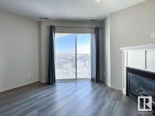 418 16035 132 Street, Edmonton, AB - Indoor With Fireplace