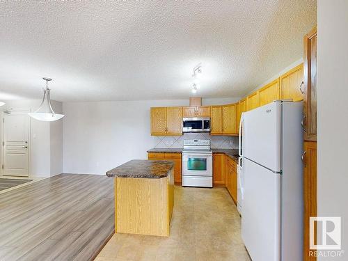 418 16035 132 Street, Edmonton, AB - Indoor Photo Showing Kitchen With Double Sink