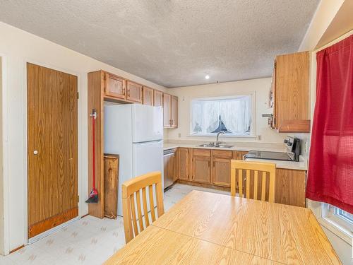 3216 41 Street, Leduc, AB - Indoor Photo Showing Kitchen With Double Sink