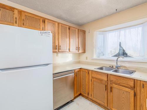 3216 41 Street, Leduc, AB - Indoor Photo Showing Kitchen With Double Sink