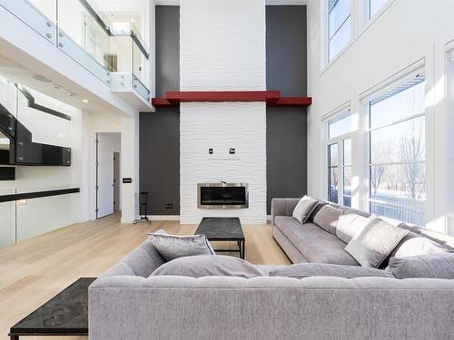 3010 Watson Landing, Edmonton, AB - Indoor Photo Showing Living Room With Fireplace