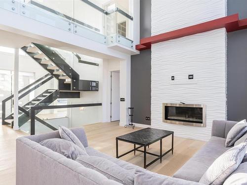 3010 Watson Landing, Edmonton, AB - Indoor Photo Showing Living Room With Fireplace