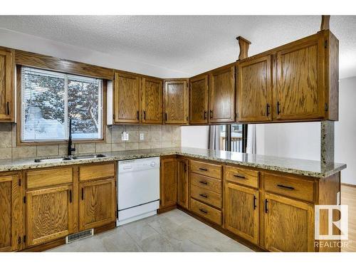 221 Oeming Road, Edmonton, AB - Indoor Photo Showing Kitchen With Double Sink