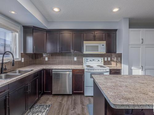 327 Nelson Drive, Spruce Grove, AB - Indoor Photo Showing Kitchen With Double Sink