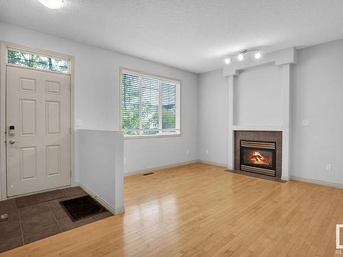 41 1650 Towne Center Boulevard, Edmonton, AB - Indoor Photo Showing Living Room With Fireplace