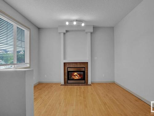 41 1650 Towne Center Boulevard, Edmonton, AB - Indoor With Fireplace