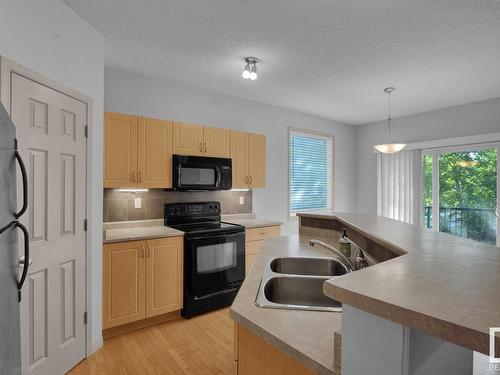 41 1650 Towne Center Boulevard, Edmonton, AB - Indoor Photo Showing Kitchen With Double Sink