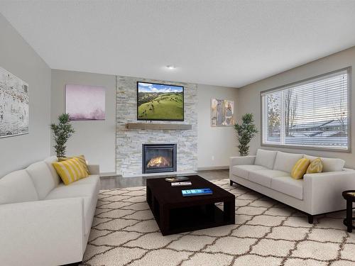 9 Southfork Close, Leduc, AB - Indoor Photo Showing Living Room With Fireplace