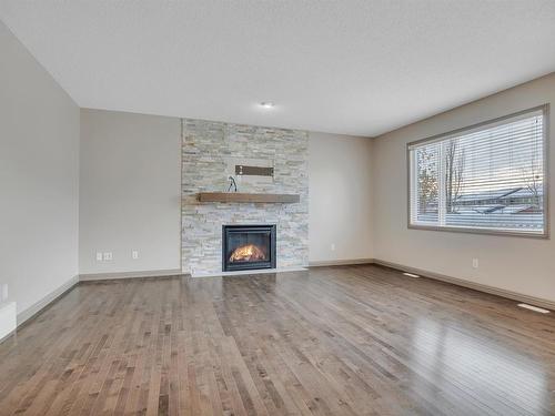 9 Southfork Close, Leduc, AB - Indoor Photo Showing Living Room With Fireplace