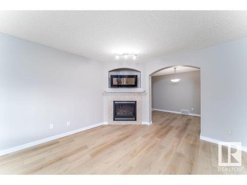 1817 Towne Centre Boulevard, Edmonton, AB - Indoor Photo Showing Living Room With Fireplace