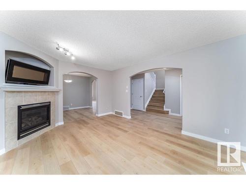 1817 Towne Centre Boulevard, Edmonton, AB - Indoor Photo Showing Living Room With Fireplace