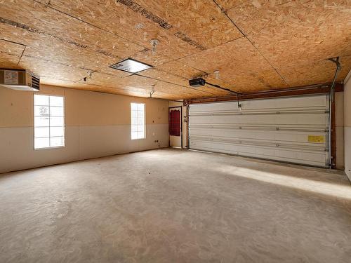 51 Windermere Drive, Spruce Grove, AB - Indoor Photo Showing Garage