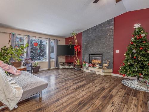 27 52318 Rge Road 25, Rural Parkland County, AB - Indoor Photo Showing Living Room With Fireplace