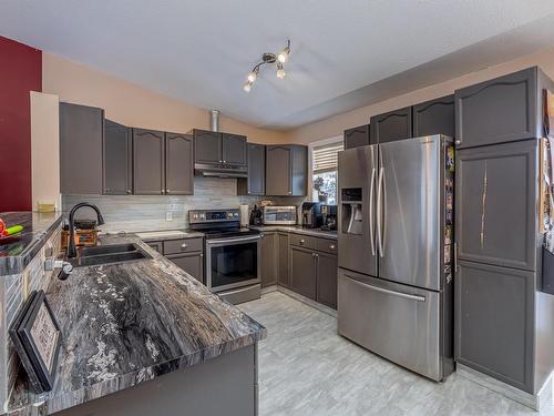 27 52318 Rge Road 25, Rural Parkland County, AB - Indoor Photo Showing Kitchen With Double Sink