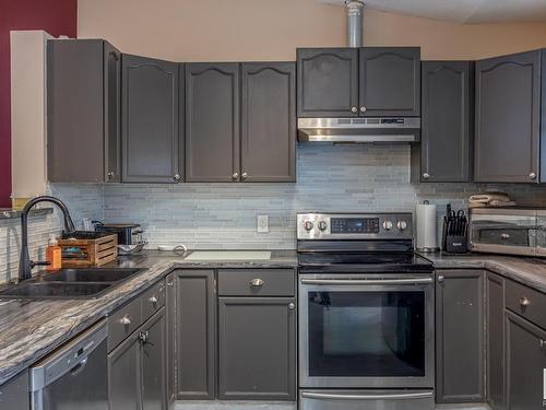 27 52318 Rge Road 25, Rural Parkland County, AB - Indoor Photo Showing Kitchen With Double Sink