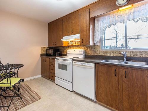 15745 107A Avenue, Edmonton, AB - Indoor Photo Showing Kitchen With Double Sink