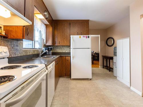 15745 107A Avenue, Edmonton, AB - Indoor Photo Showing Kitchen With Double Sink